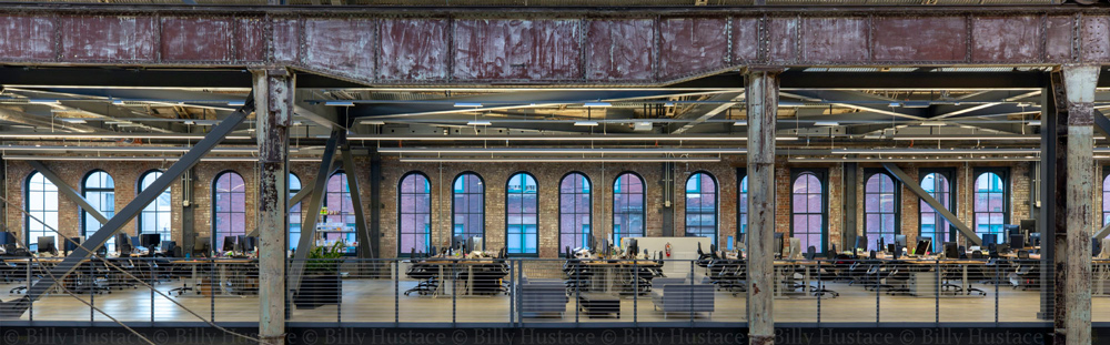 Contemporary office structure with extensive windows and an expansive space, featuring Winco’s 3250 Steel Replica windows.