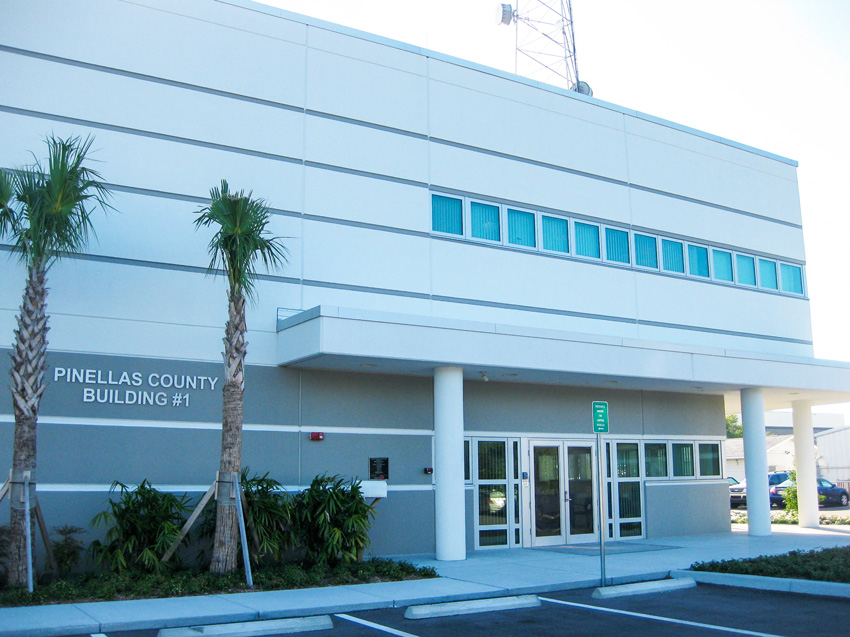 The Pinellas County Emergency Response Center, a white and gray building, showcases 164 tornado-rated windows by Winco.