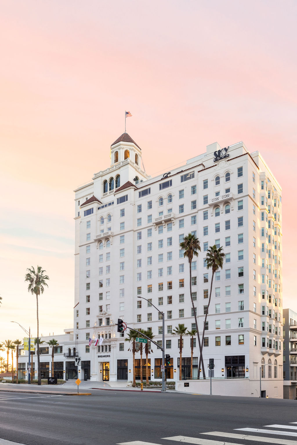 Exterior building-with palm trees at dusk