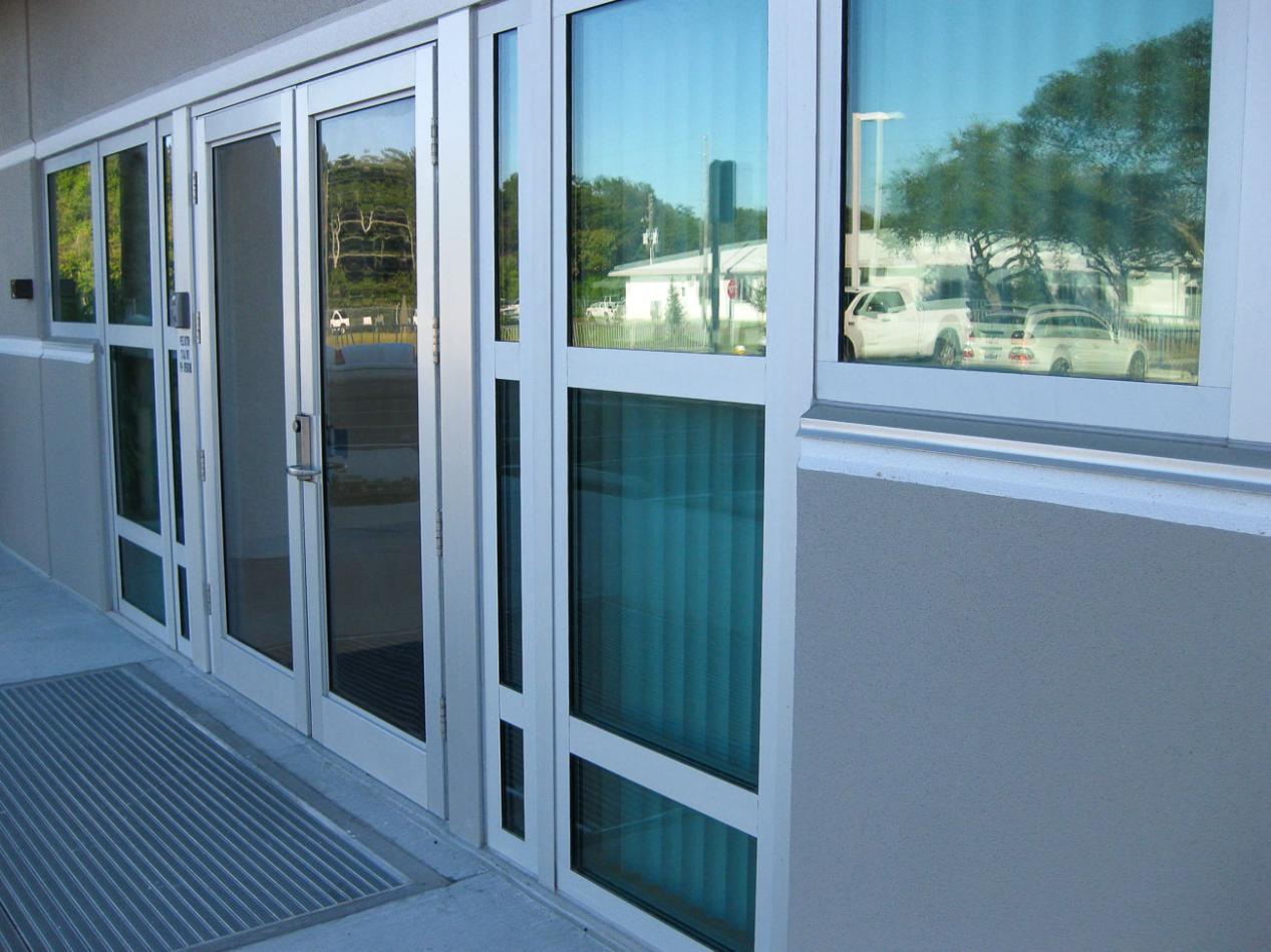 The Public Works Emergency Responders Building (PWERB) is a two-level building that holds a LEED Gold Certification and features Winco tornado-rated windows. Close-up of a building, featuring a tornado resistant window.